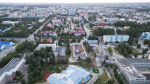 город